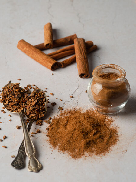 These cinnamon sticks are made from the inner bark of a South Asian species of evergreen called Cinnamomum cassia. These sticks, called quills, have an abundance of the organic compound cinnamaldehyde in their essential oils. This compound gives the spice its pungent flavor and distinctive warm aroma.