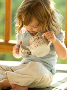 Showing Children the Way to Tea Many parents buy tea sets for little girls