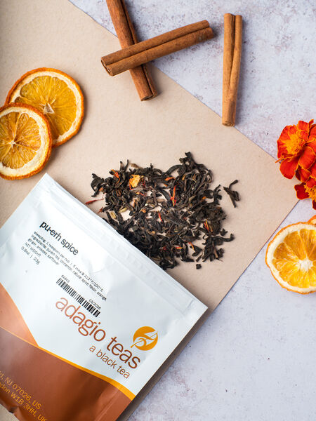 Pu-Erh Tea: Bold, Earthy, and Full of Flavor Pleasantly perky spices add warmth and sweetness to the mellow mineral notes of Pu-Erh. Sweet cinnamon and anise with tingly ginger liven up the palate while soothing the soul. A great companion for a chilly day.