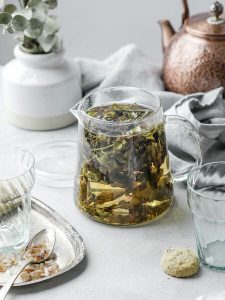 Beginner’s Guide to Grandpa Style Brewing Master's high fragrance, light roast Zhang Ping Shui Xian is a rare and unique Fujian Oolong that is hand compressed into individually wrapped, aromatic briquettes of tea. The large green leaves produce a flavorful cup of light honey notes, that are floral, layered, and lingering.