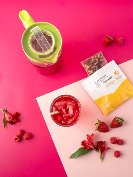 Refreshing Teas for the Ultimate Summer Vibes Even when the strawberry harvest is waning for the year, our Wild Strawberry herbal blend will have you smiling like the first pick of the season. Fresh strawberries, apple pieces, hibiscus flowers, and rose hips create a mellow, almost dessert-like tea. Sweet strawberry and sugared rhubarb aroma, beautiful warm berry color, pleasantly aromatic and not super sweet. A caffeine-free cup of pure delight.