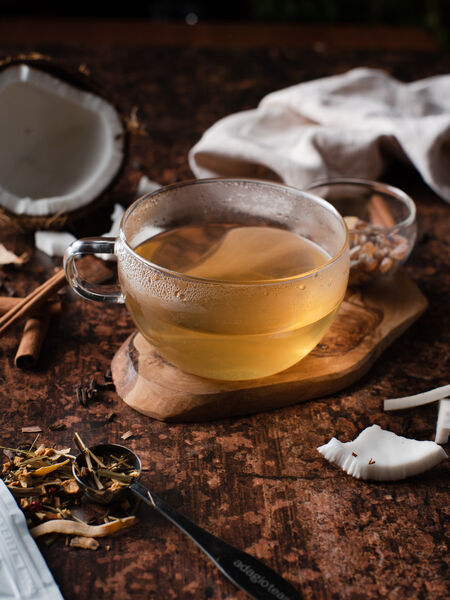 White tea, chai spices with lemongrass, coconut, fruit pieces and peppercorn combine for a light-bodied zesty cup. Light yellow with complex notes of lemongrass, fruit and spice that dance on the palate. White Chai has a fiery kick of the peppercorn that lingers in the soft sweetness of the fruit.